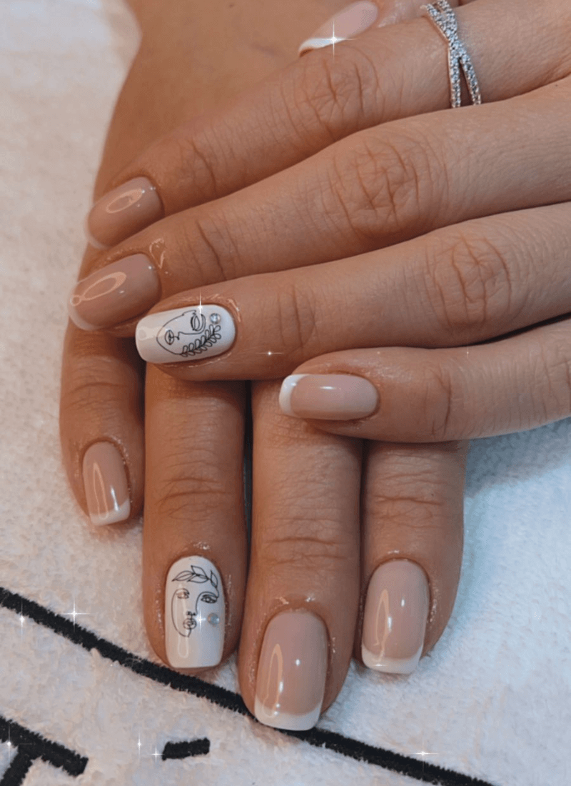 Neutral French manicure with fine-line accent art